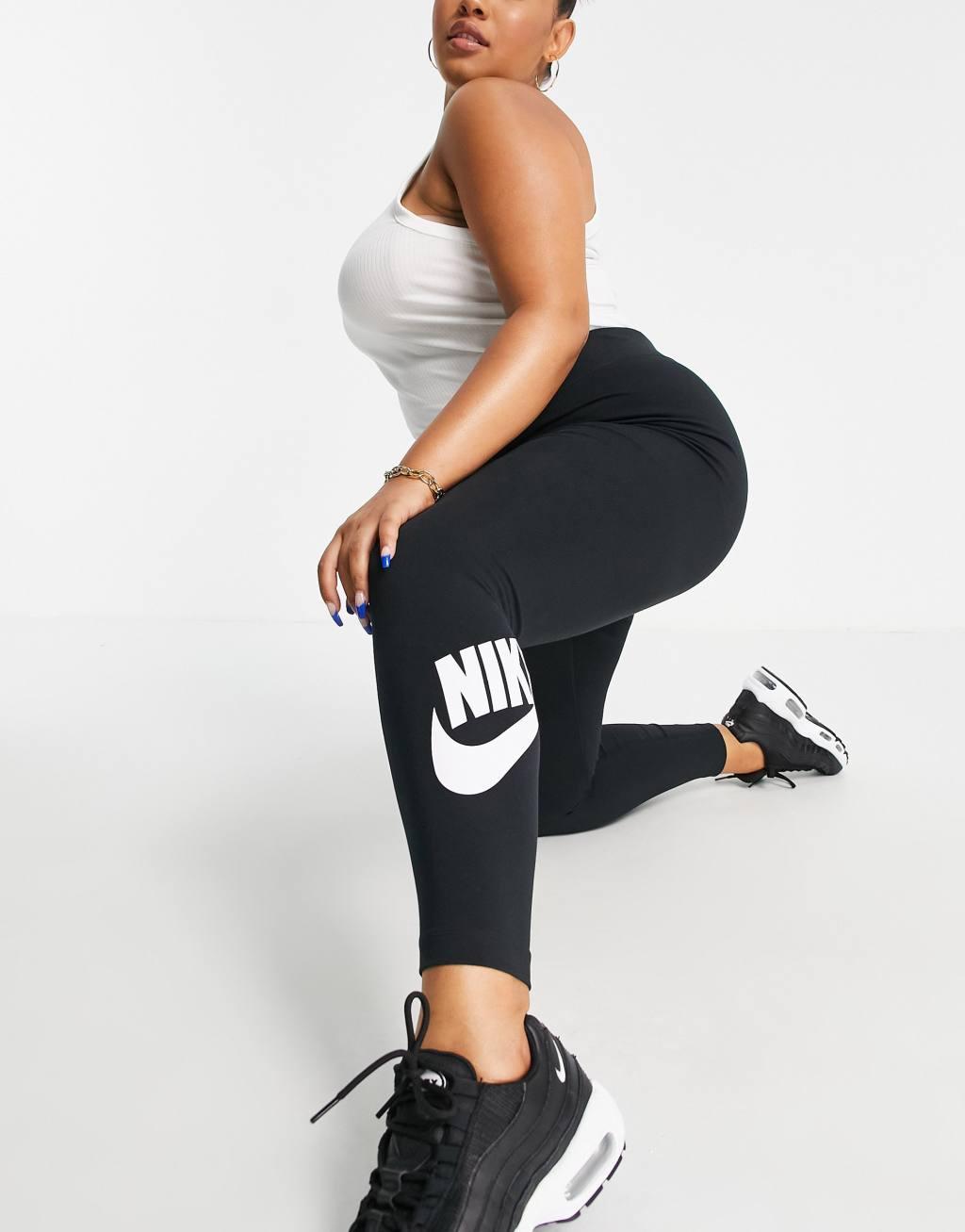 Nike Essential Plus leggings in black Product Image