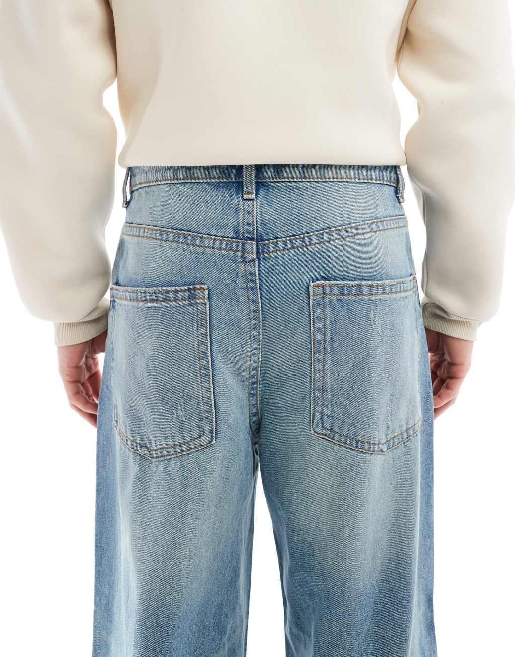 ASOS DESIGN super baggy jeans with rips in vintage light wash blue Product Image