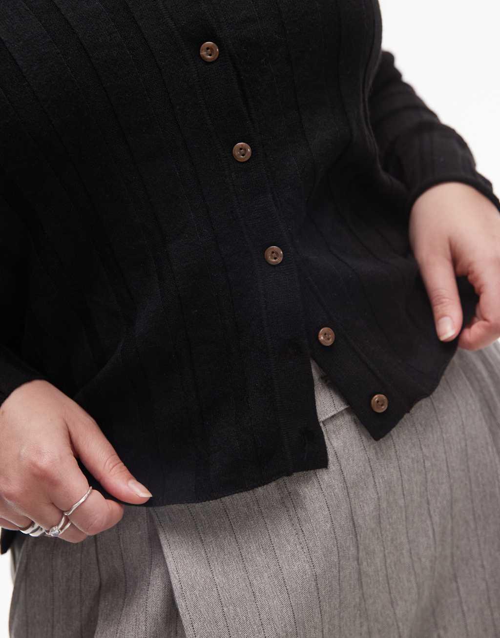 Mango curve ribbed button down cardigan in black Product Image