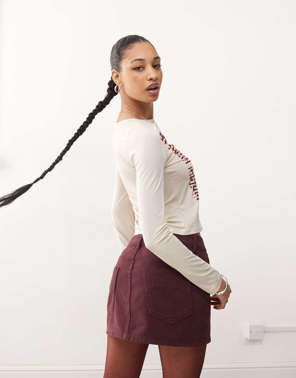 COLLUSION denim mini skirt in burgundy Product Image