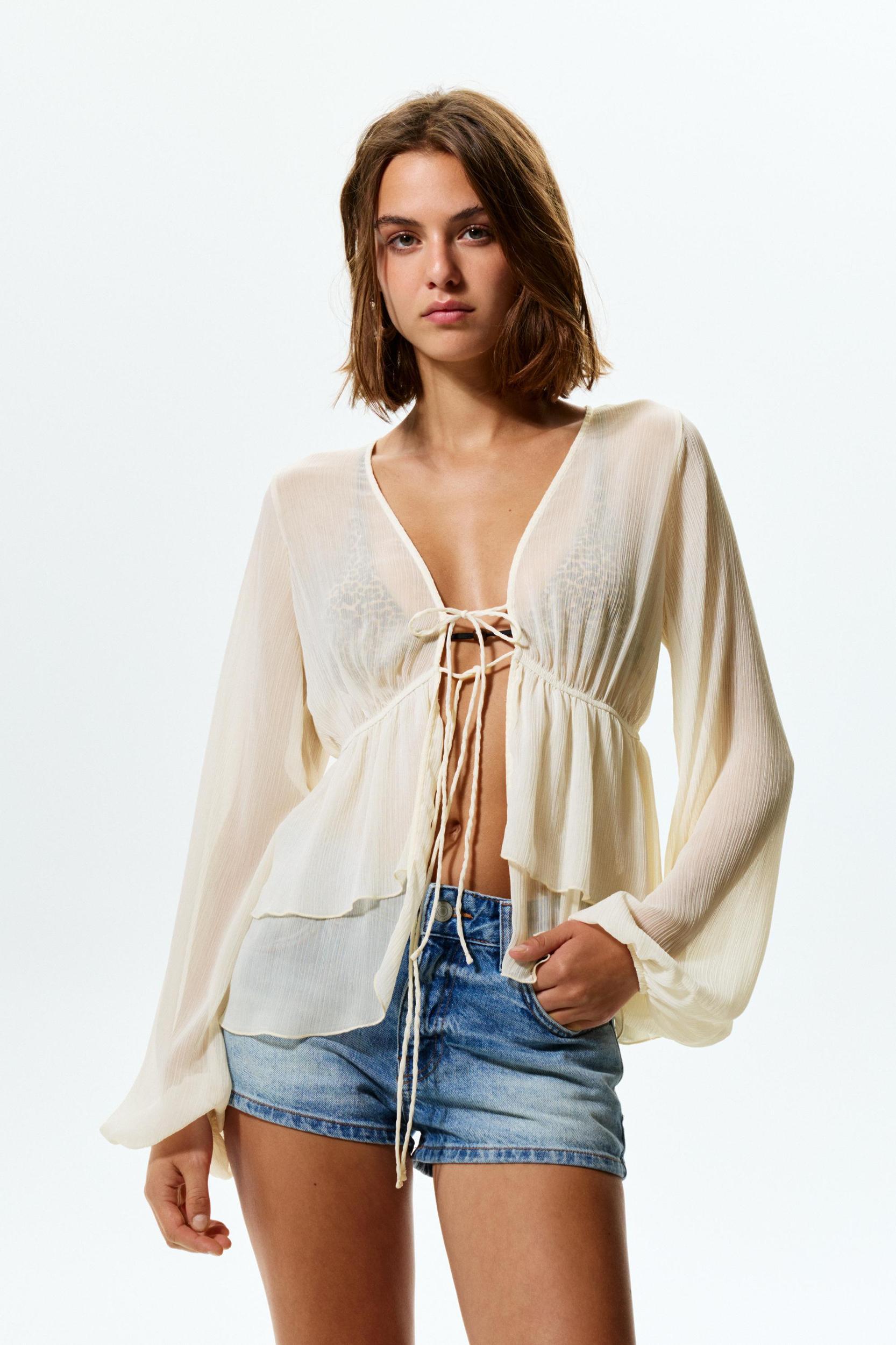 Flowing blouse with ruffles Product Image