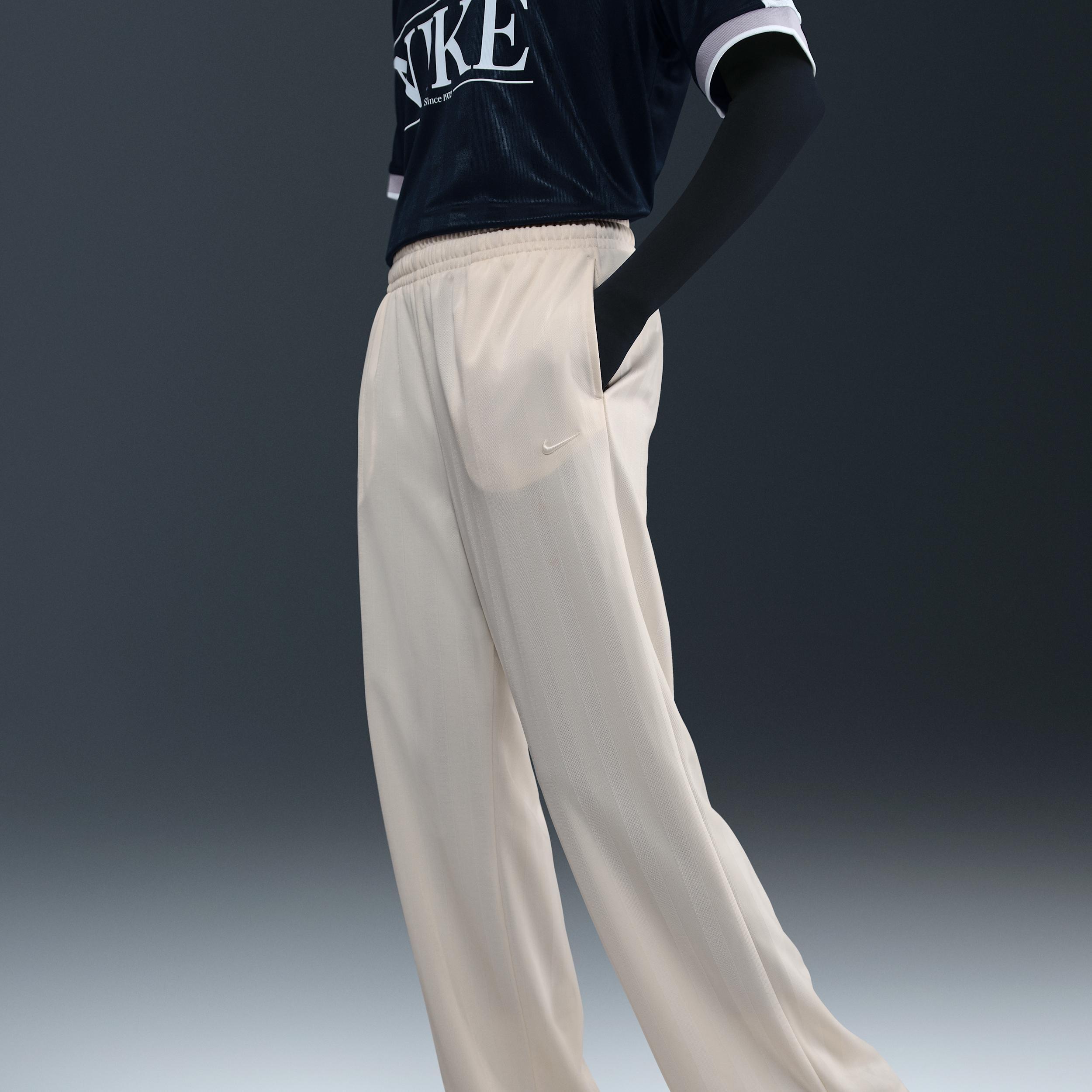 Womens Nike Sportswear Mid-Rise Loose Jacquard Striped Track Pants | HV5133-110 Product Image