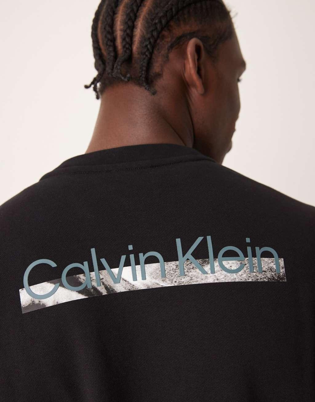 Calvin Klein back print graphic sweatshirt in black Product Image