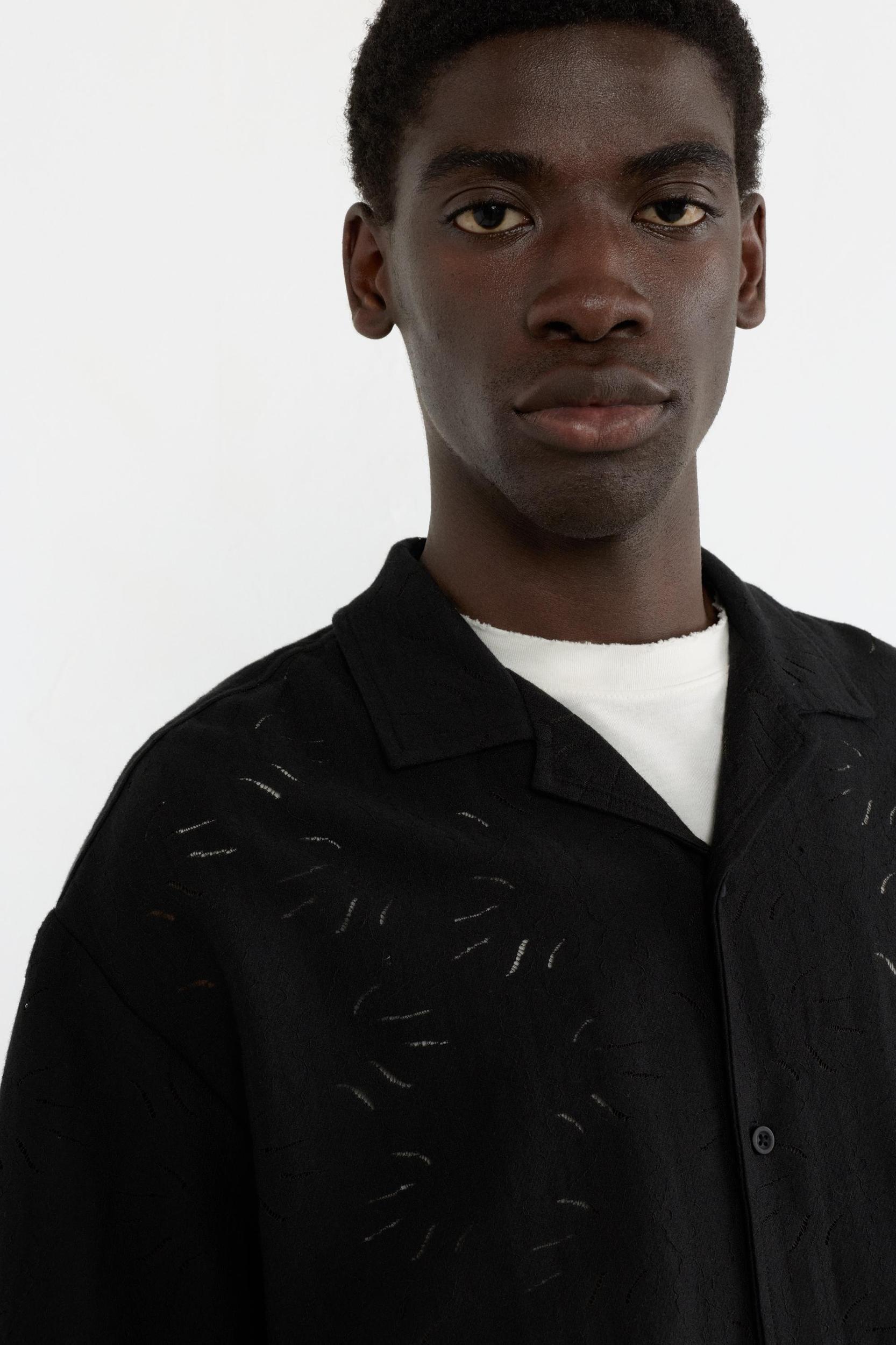 Black short sleeve shirt Product Image