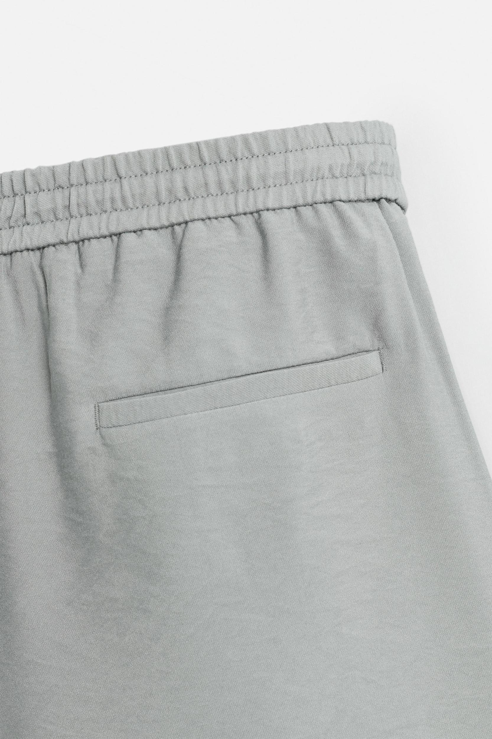 FLOWY RELAXED FIT BERMUDA SHORTS Product Image