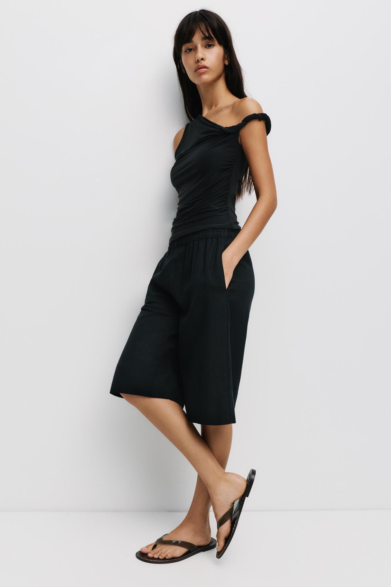 Asymmetric top Product Image