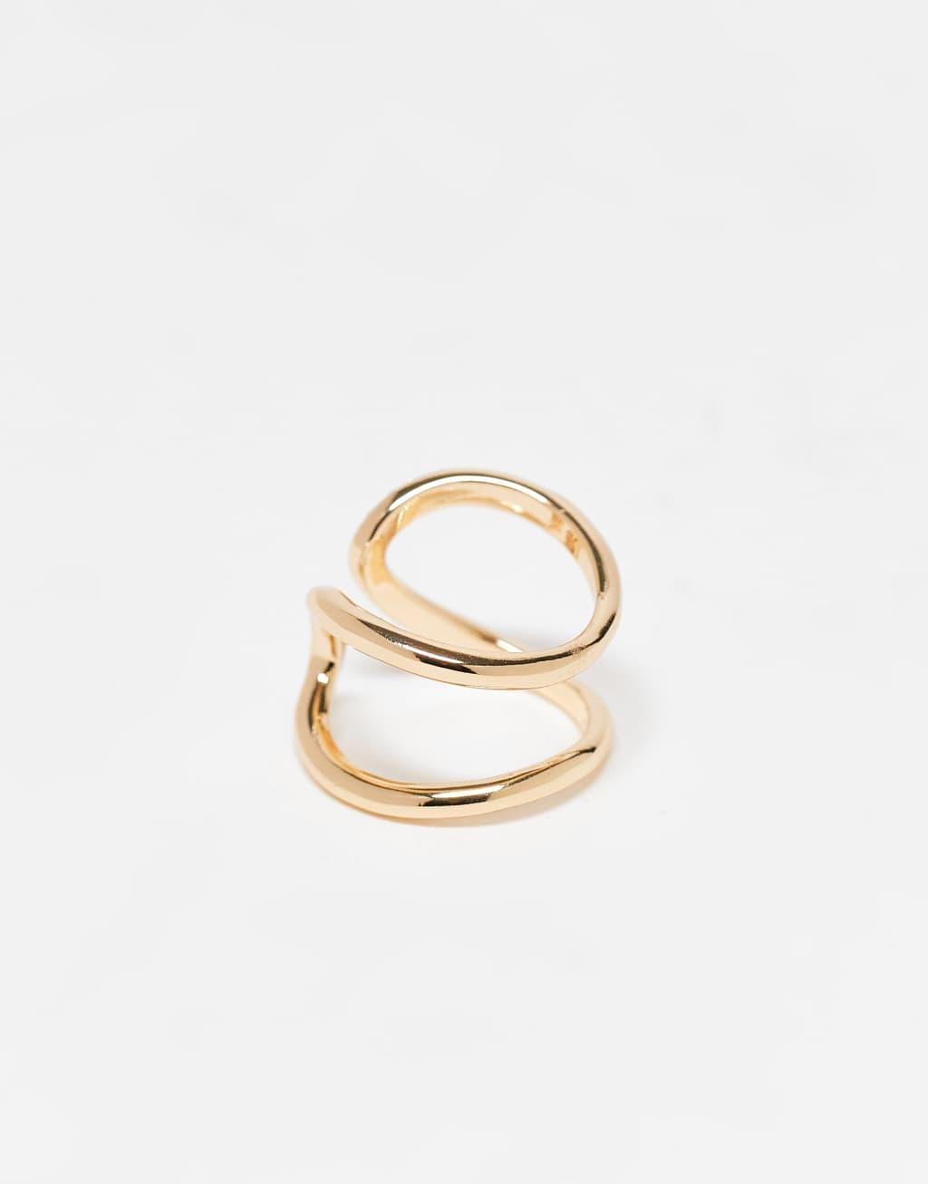 ASOS DESIGN Curve ring with wrap around crystal detail in gold tone Product Image