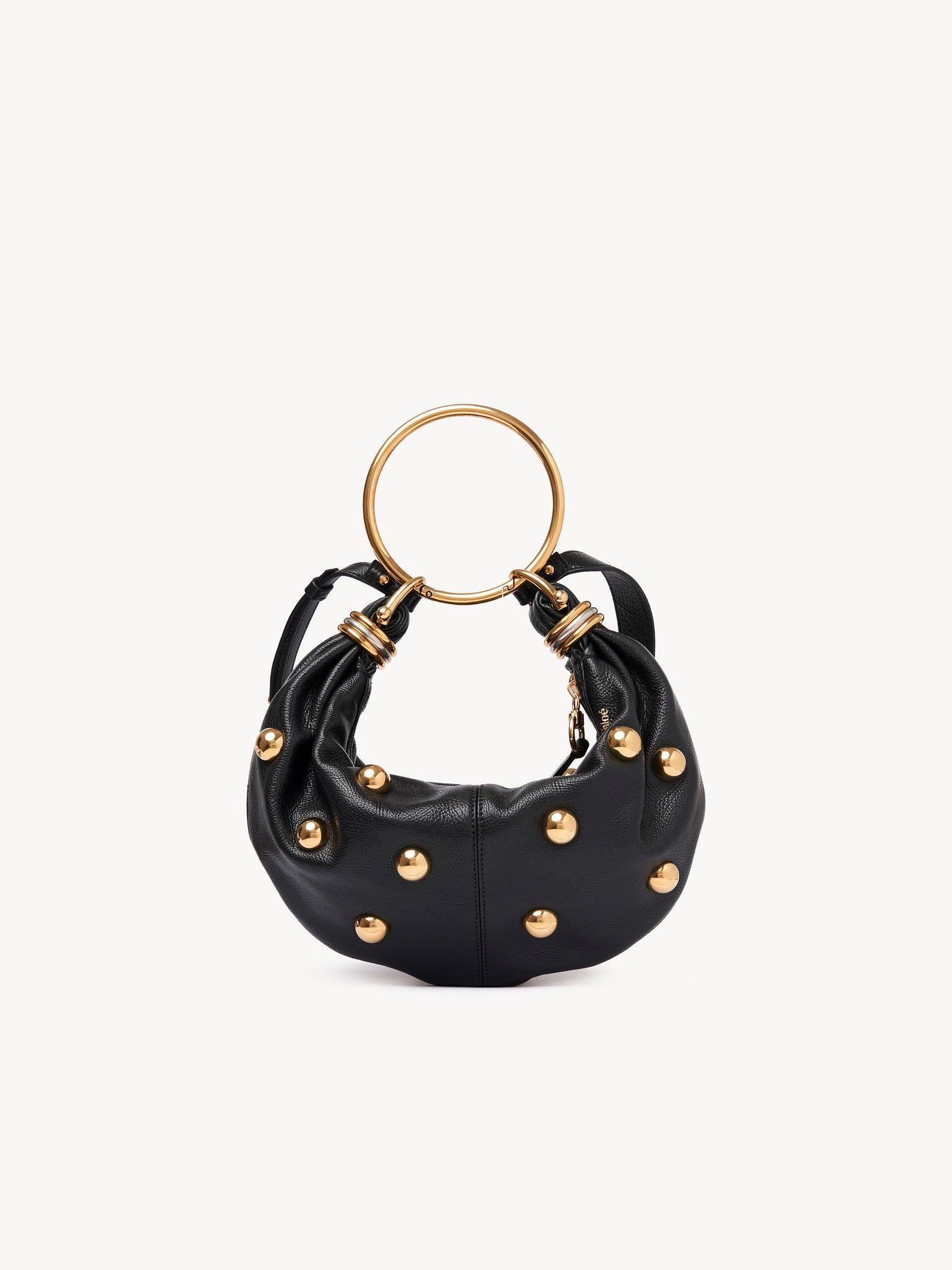 Small Bracelet hobo bag in grained leather with studs Product Image