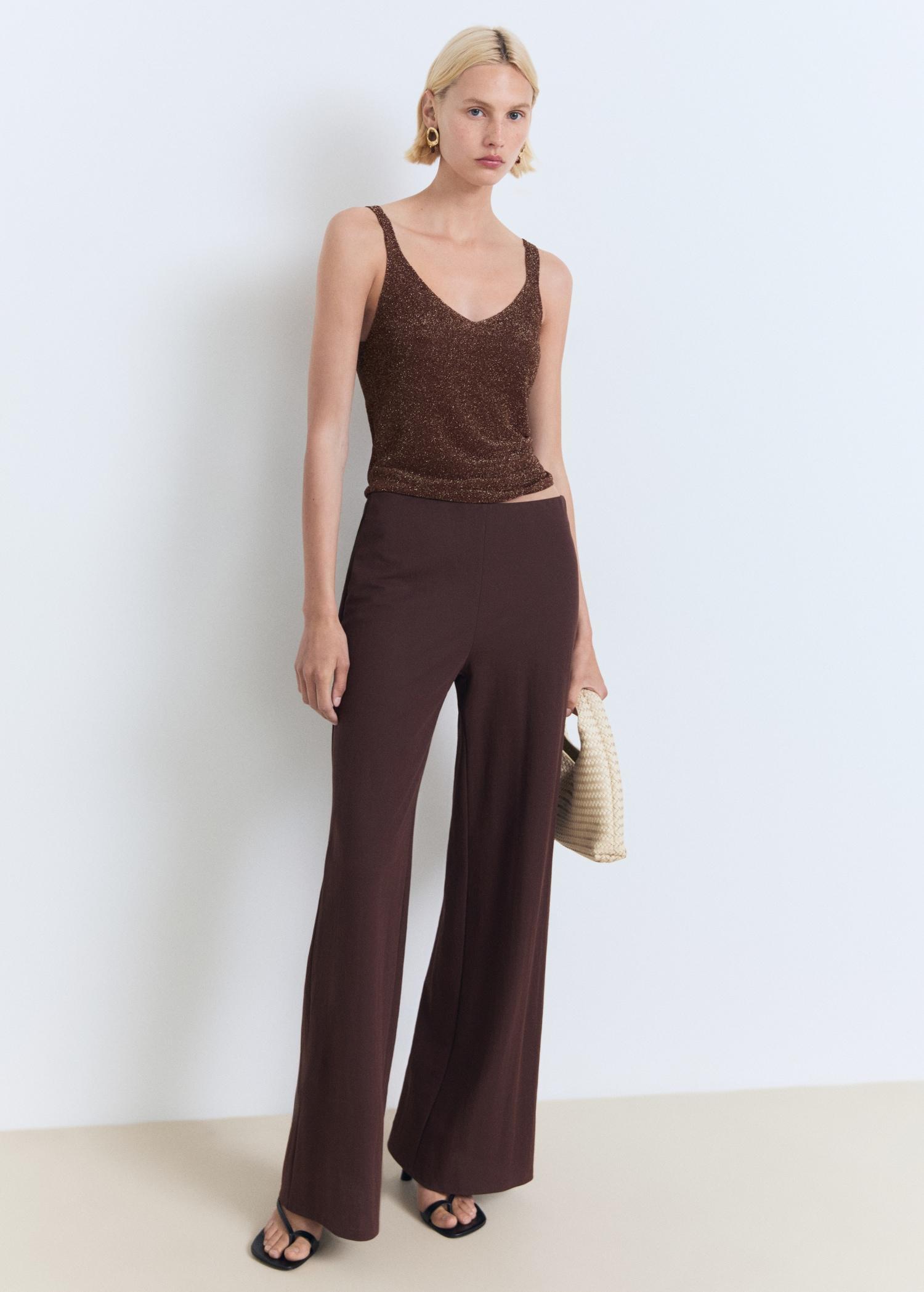 Lurex knitted V-neck top - Women | MANGO USA Product Image