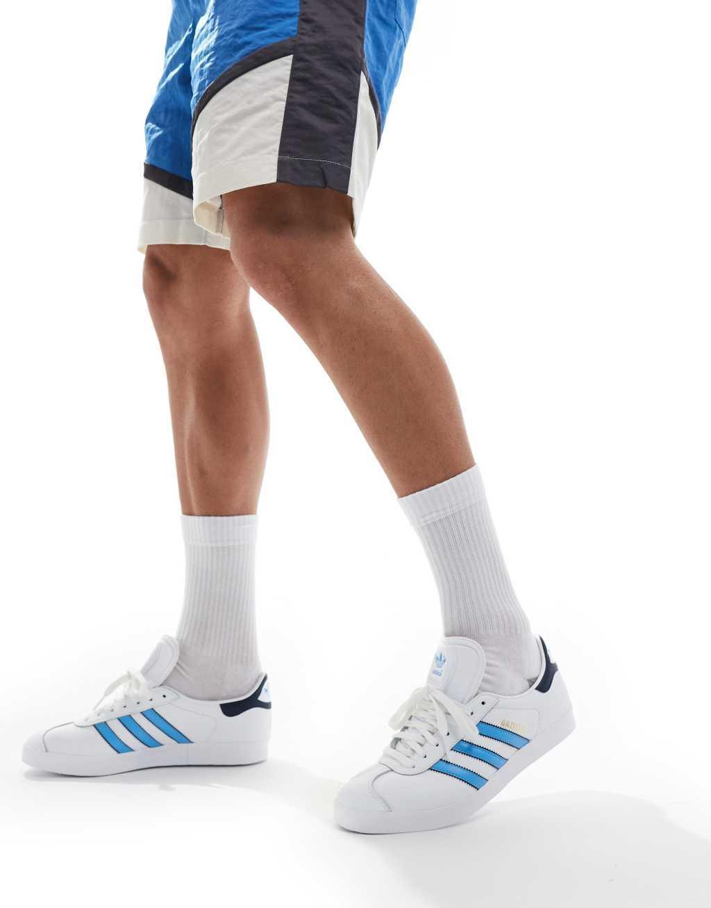 adidas Originals Gazelle sneakers in white and blue Product Image