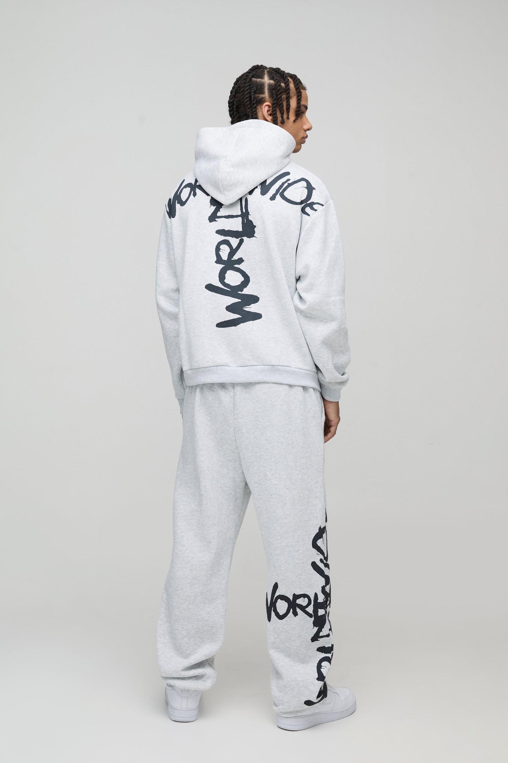 Oversized Boxy Zip Through Worldwide Graffiti Print Zip Through Tracksuit | boohooMAN USA Product Image