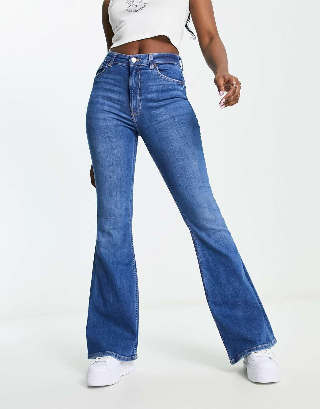 Bershka high rise flared jeans in mid blue Product Image