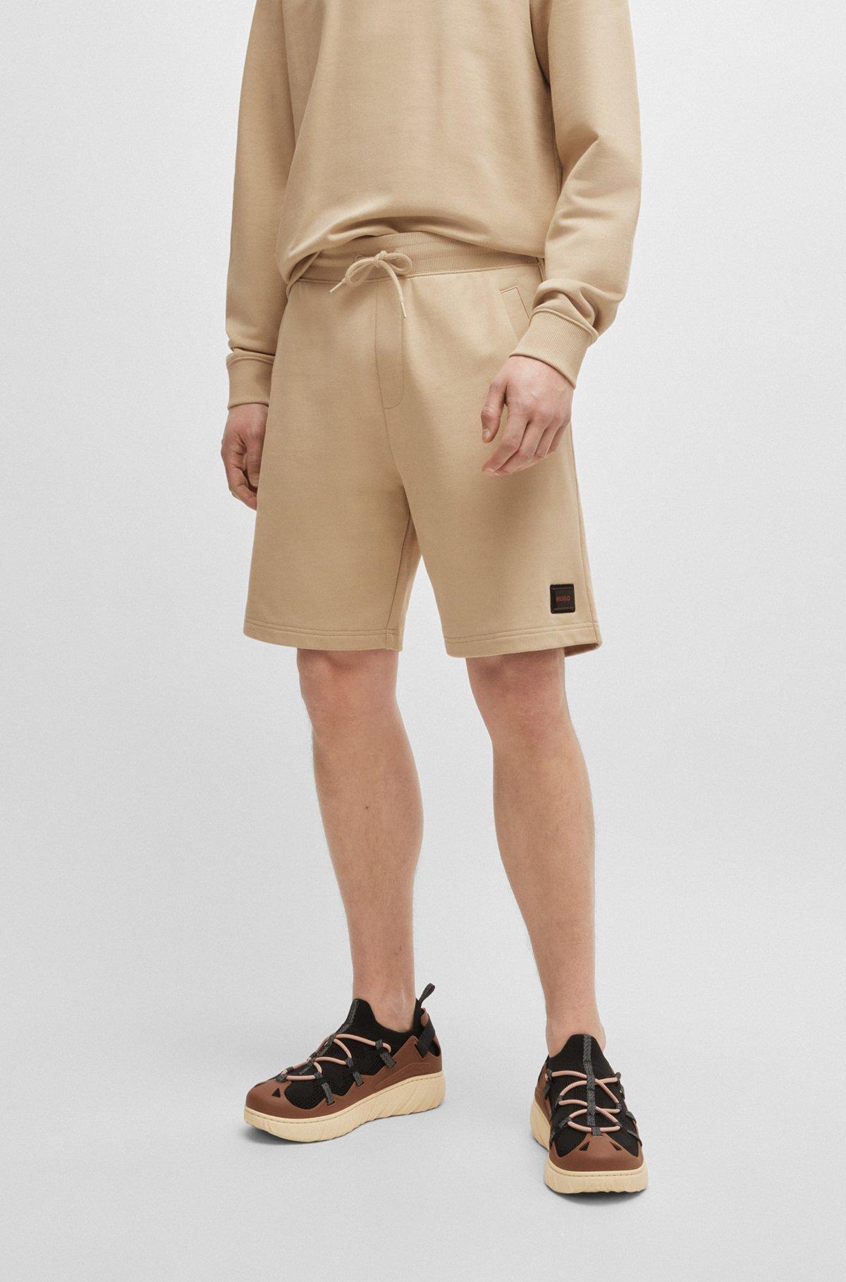 Cotton-terry relaxed-fit shorts with logo trim Product Image