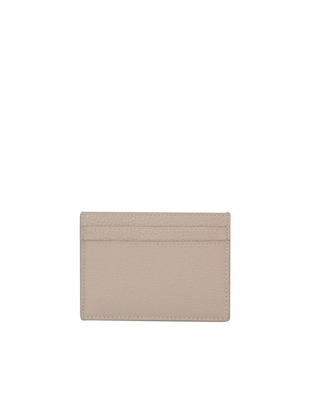 Tiny Cassandre Leather Card Holder In Beige Product Image