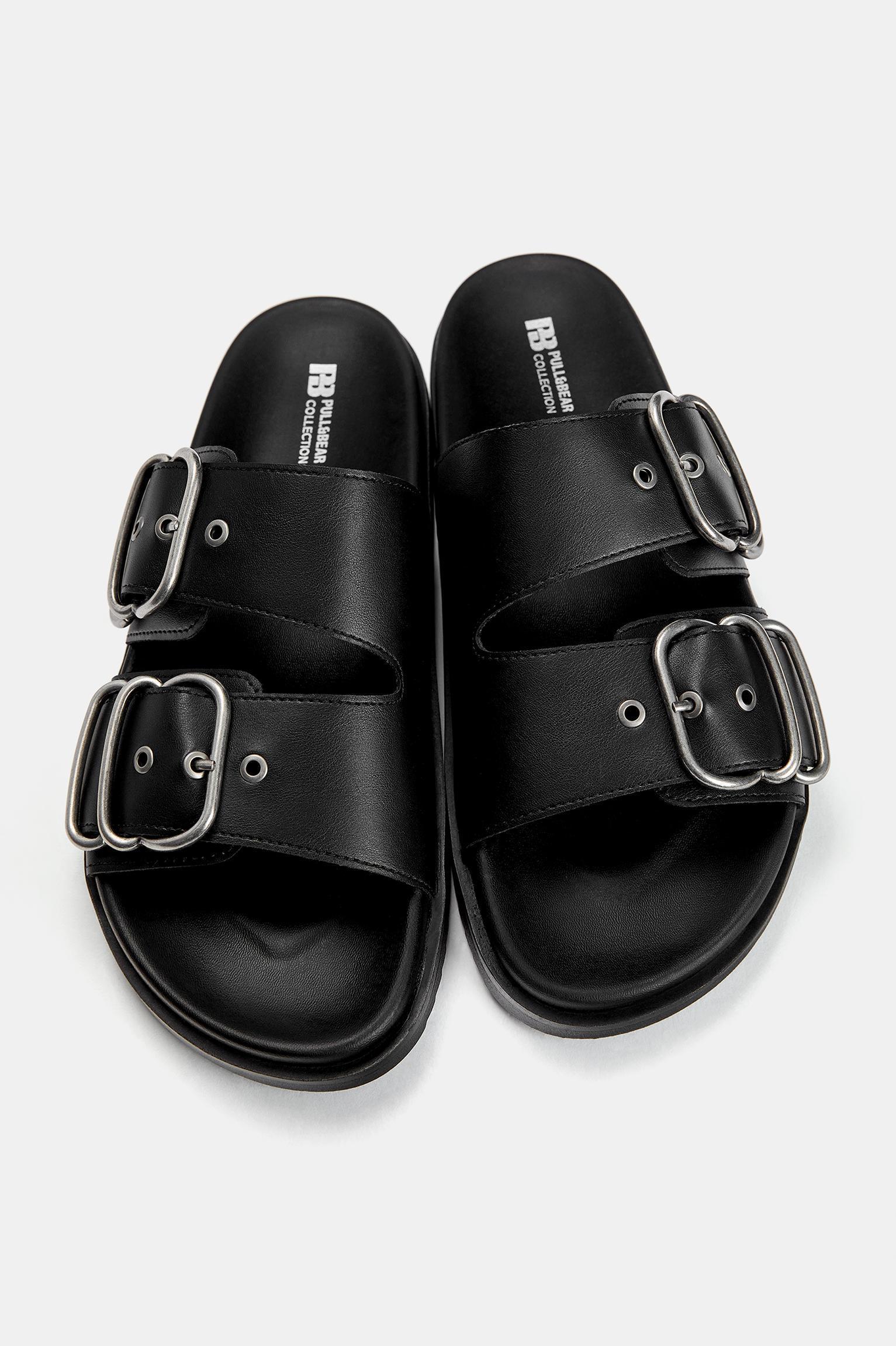 Flat sandals with buckles Product Image