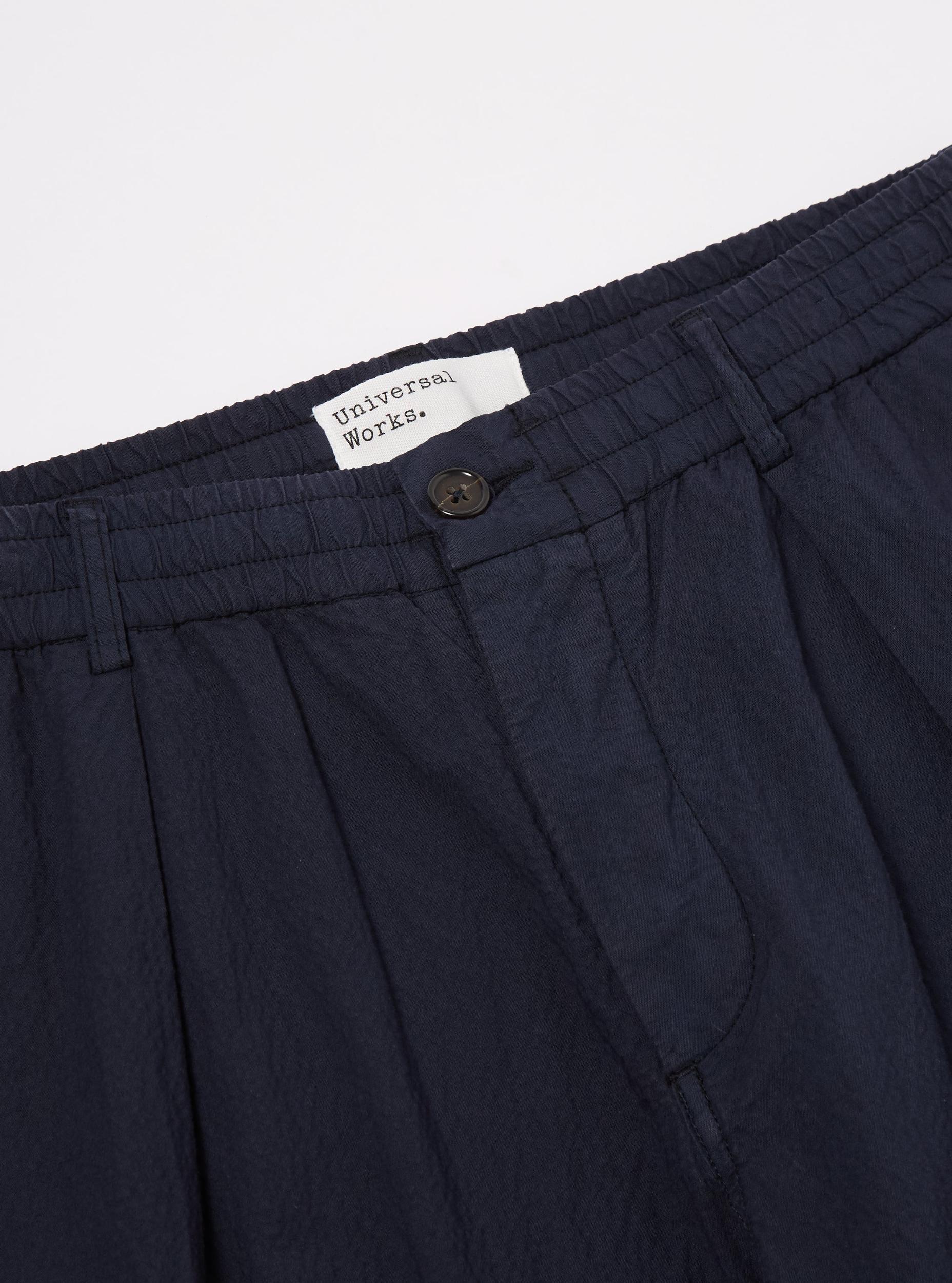 Universal Works Pleated Track Pant in Navy Seersucker II Product Image