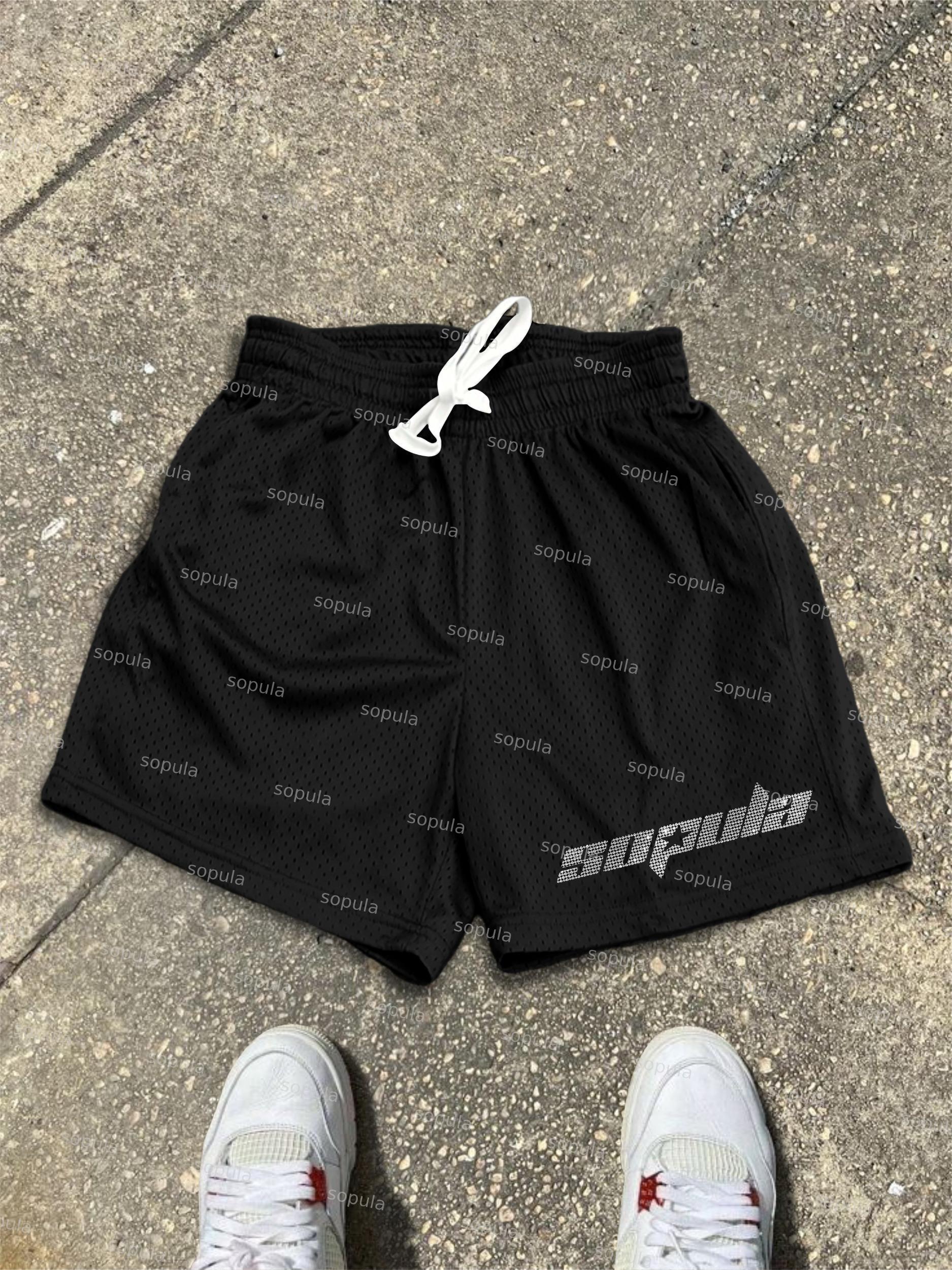 Cross Graphic Dot Mesh Shorts Product Image