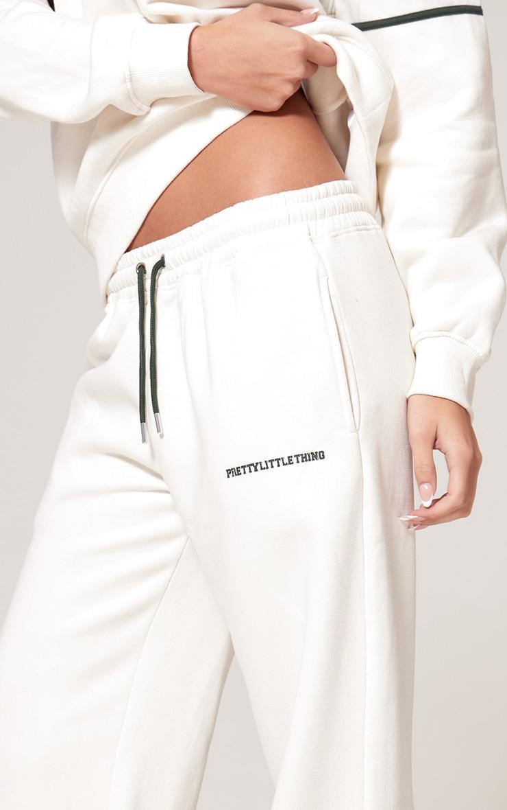 PRETTYLITTLETHING Cream Contrast Print Wide Leg Sweatpants Product Image