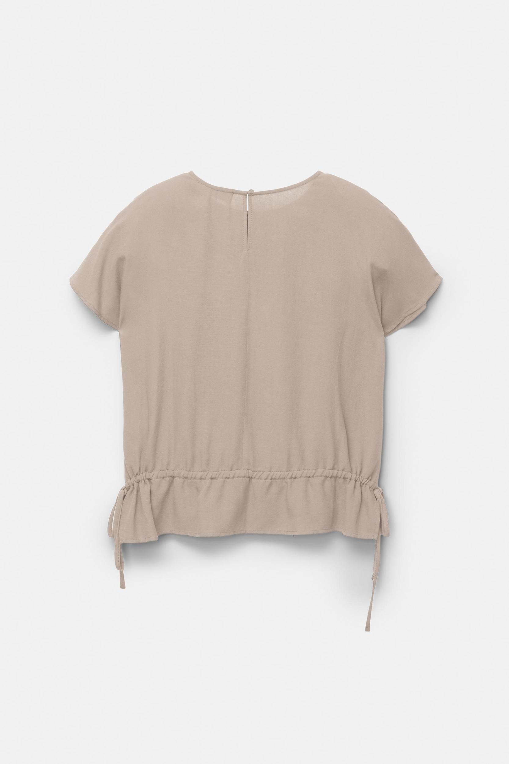 Top with ties at the waist Product Image