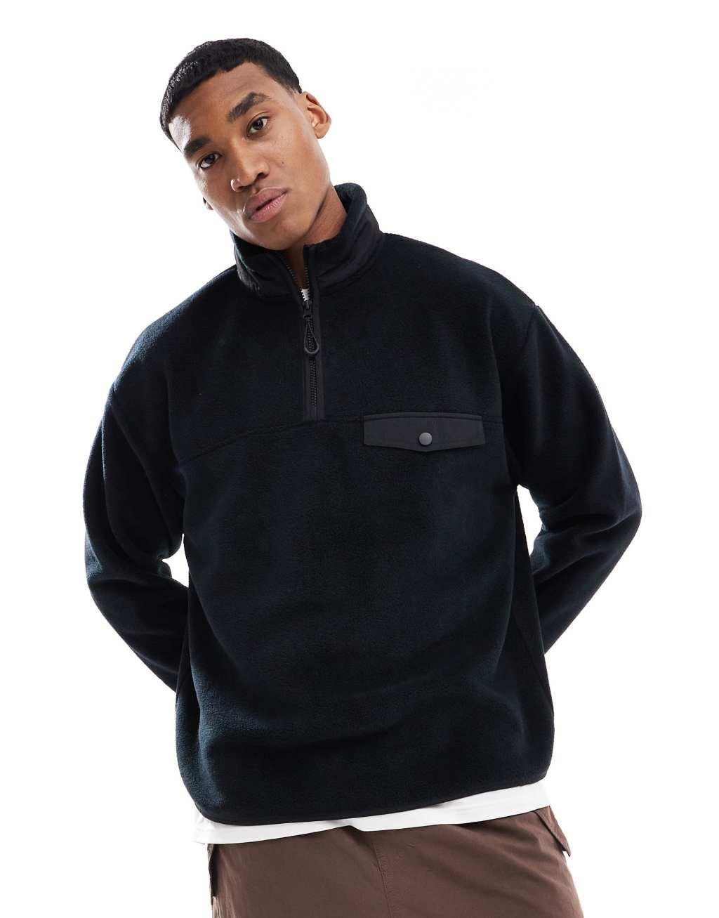 ASOS DESIGN oversized half zip fleece sweatshirt with chest pocket in black Product Image