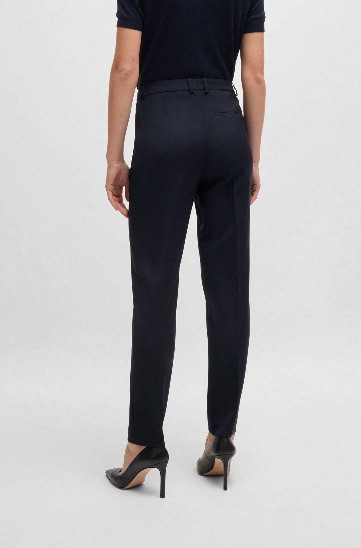 Regular-fit tapered-leg pants in checkered virgin wool Product Image