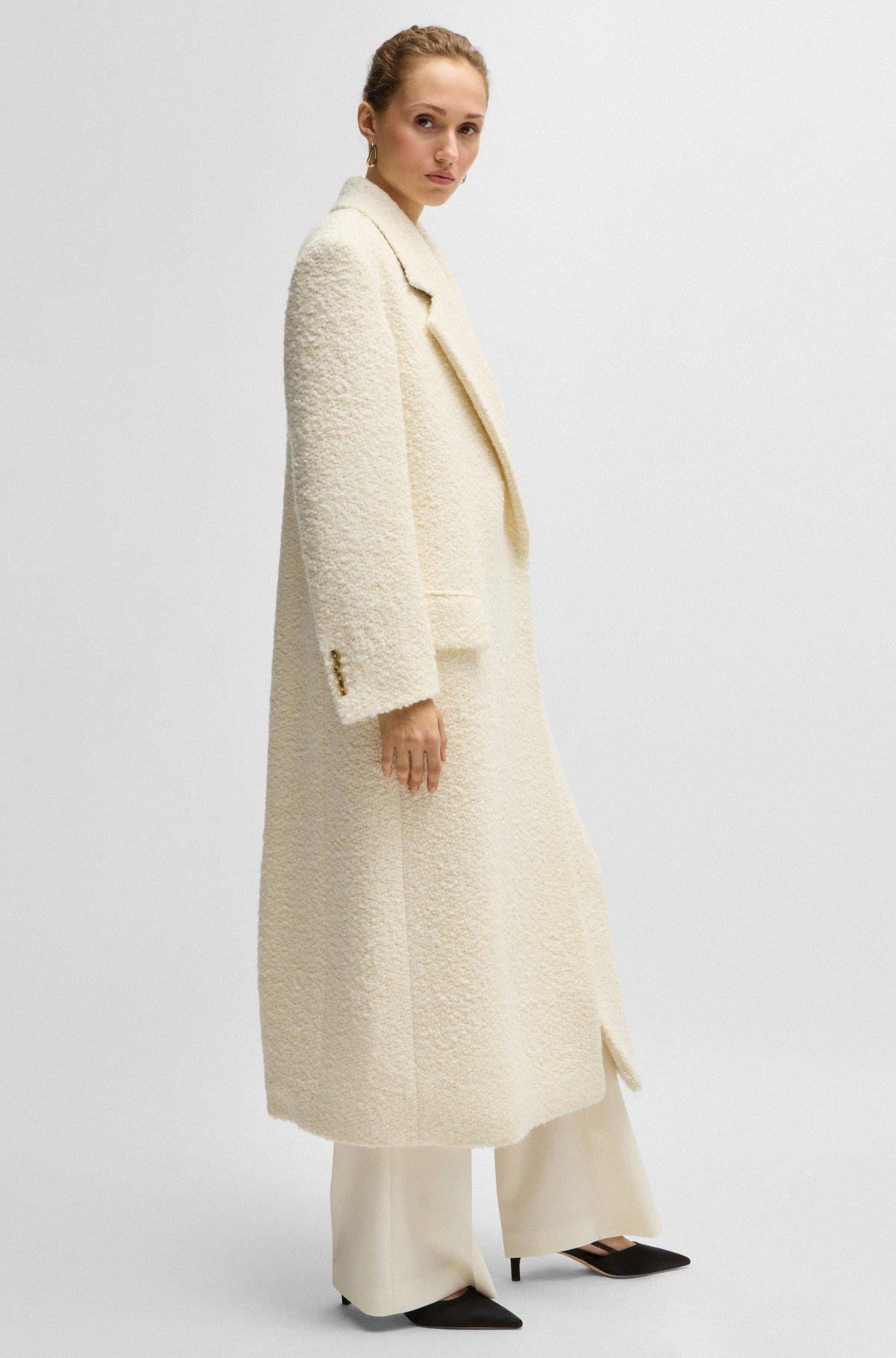 Bouclé-tweed slim-fitting coat with quilted lining Product Image