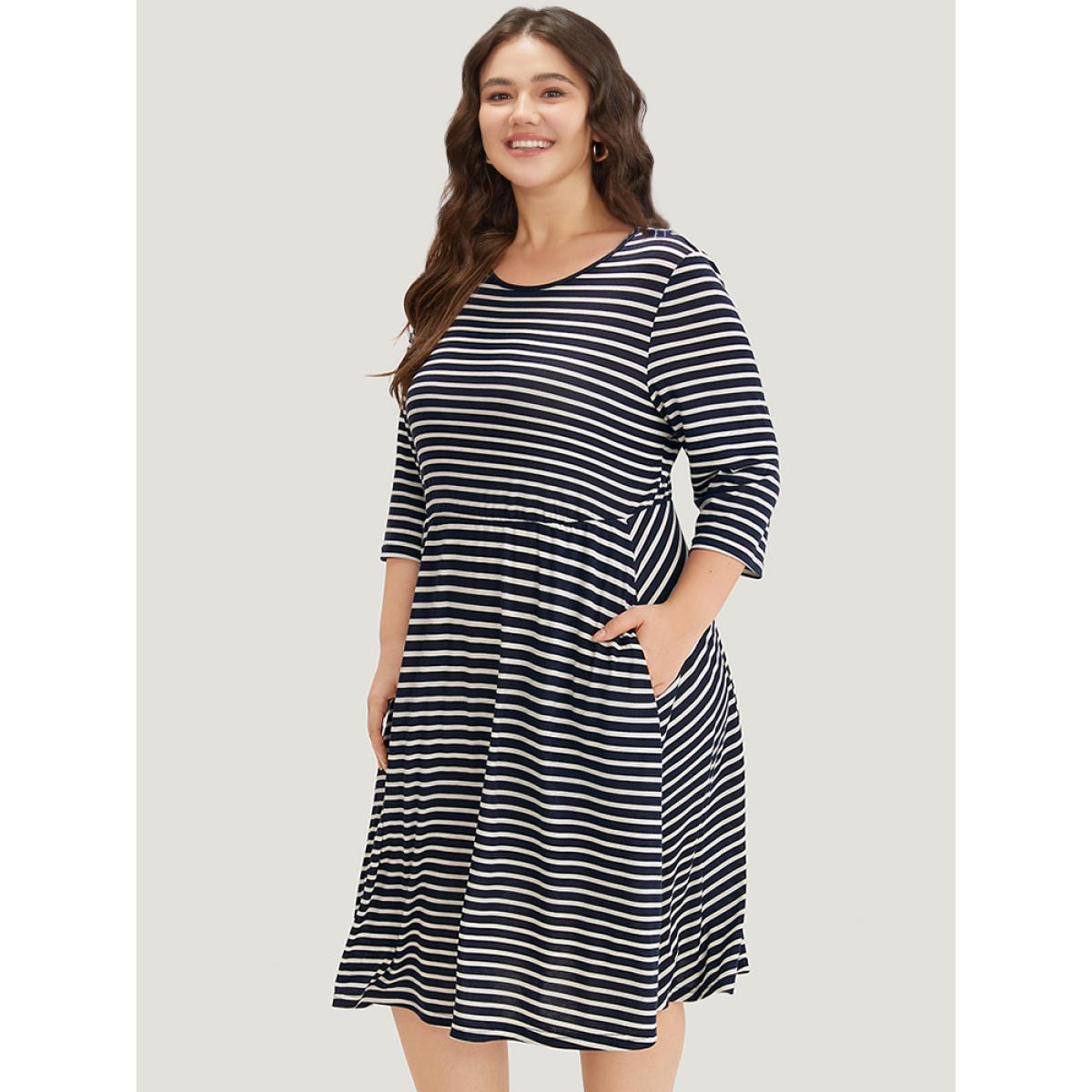 Plus Size Striped Crew Neck Pocket Twist Back Dress Indigo Women Casual Elastic Waist Round Neck Elbow-length sleeve Curvy Midi Dress BloomChic 12/L Product Image