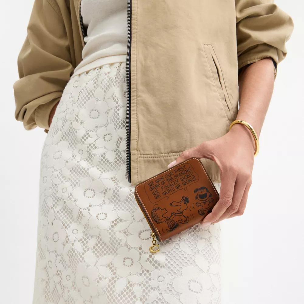 Coach X Peanuts Essential Billfold Wallet With Newspaper Print Product Image
