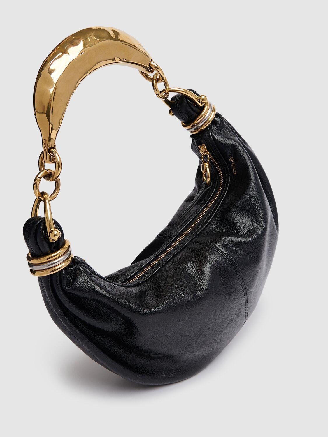 Bracelet Grained Leather Top Handle Bag In Black Product Image