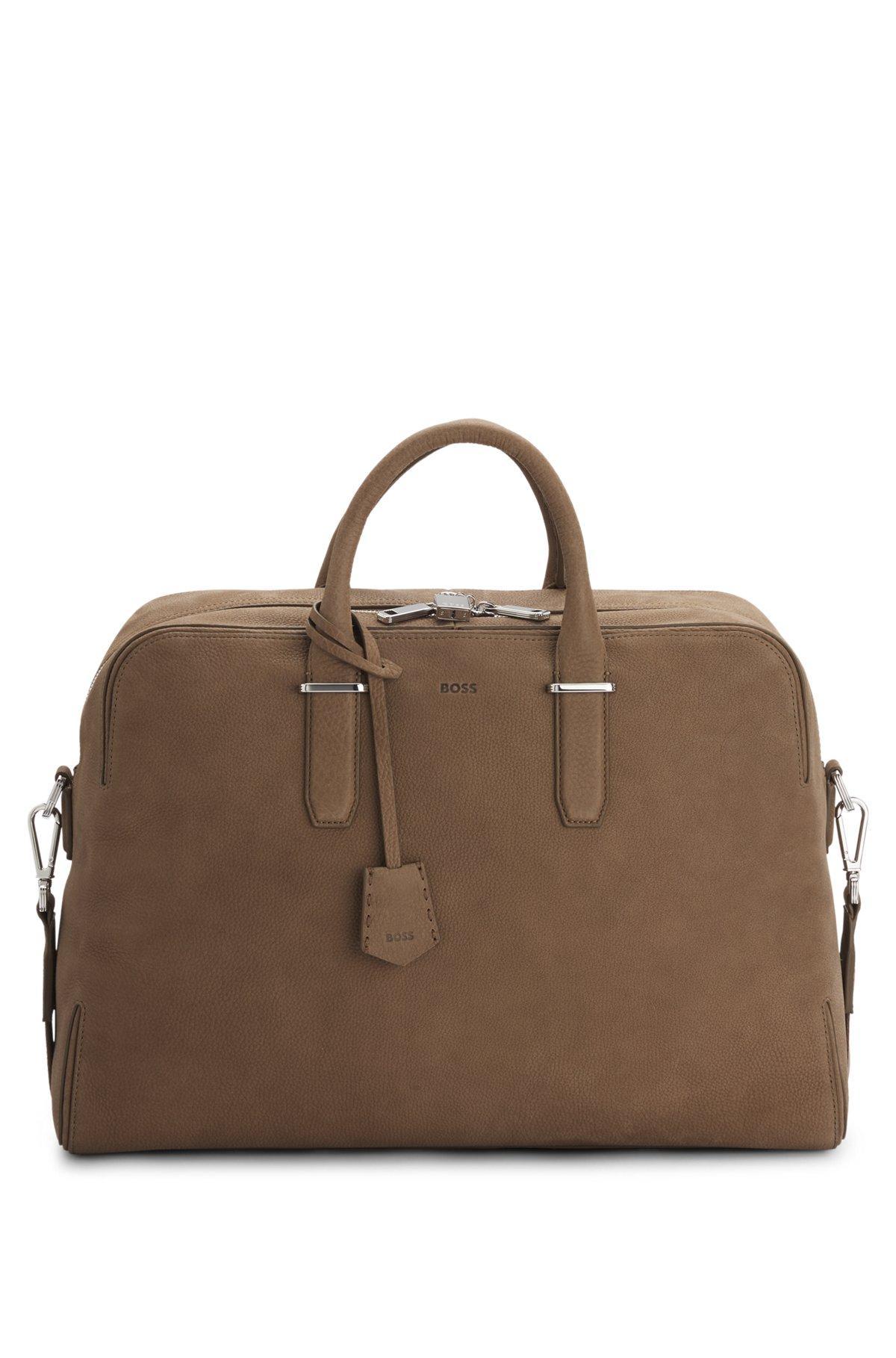 Grained-leather holdall with embossed logo Product Image