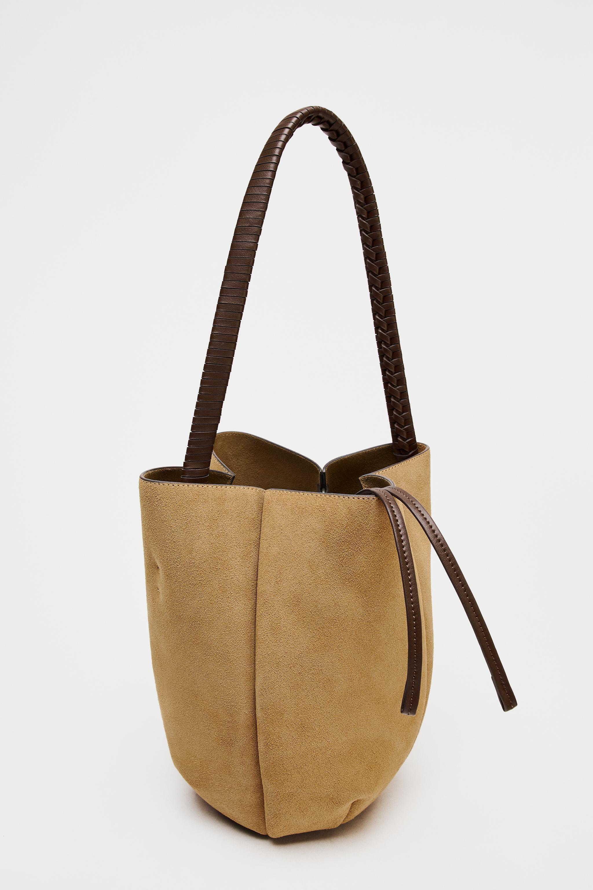 WOVEN SPLIT LEATHER FLOWER BUCKET BAG Product Image