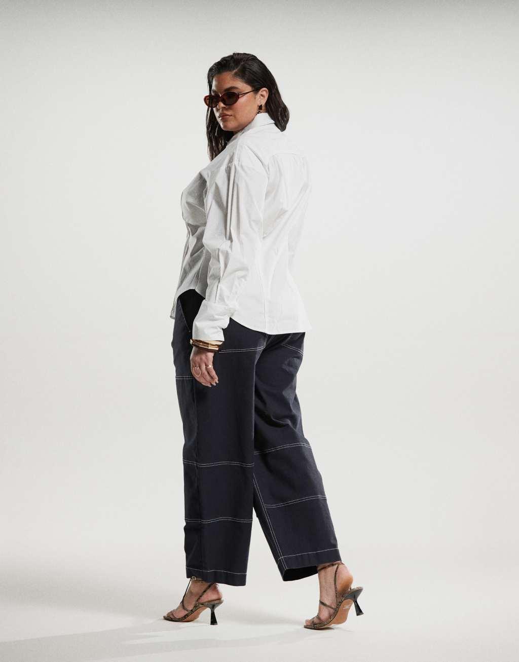 ASOS DESIGN Curve barrel leg pants in navy with contrast stitch Product Image