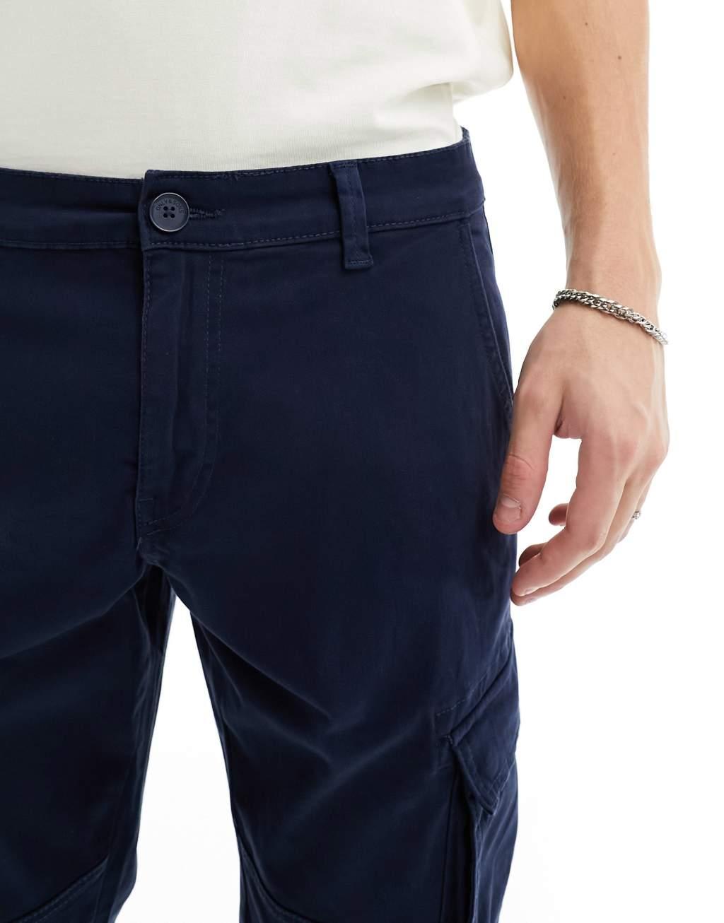 ONLY & SONS tapered fit cargo pants with cuffed bottoms in navy Product Image