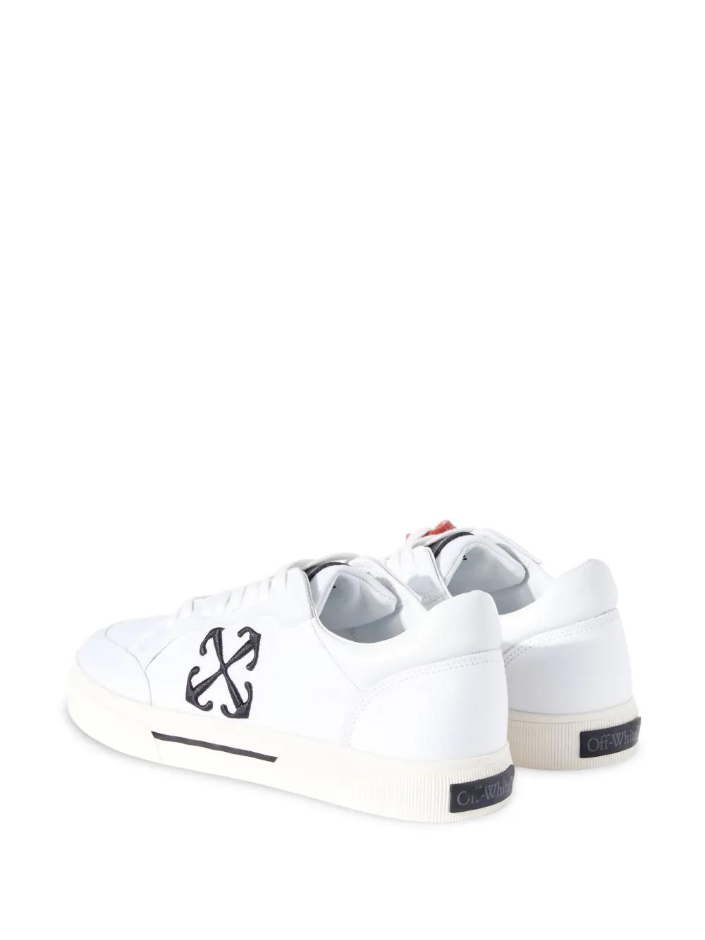 Vulcanized contrasting-tag canvas sneakers Product Image