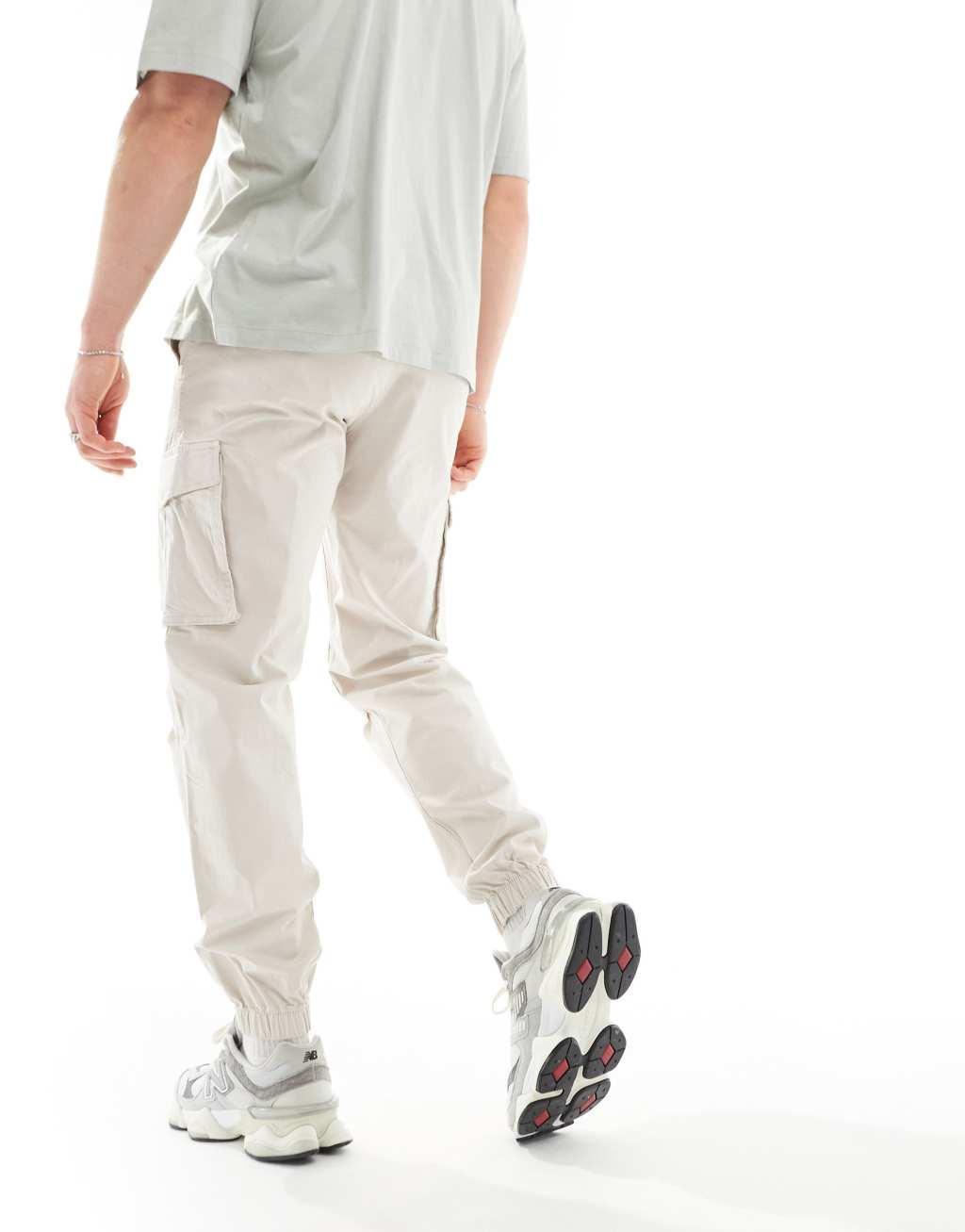 Jack & Jones relaxed fit cuffed cargo pants in beige  Product Image