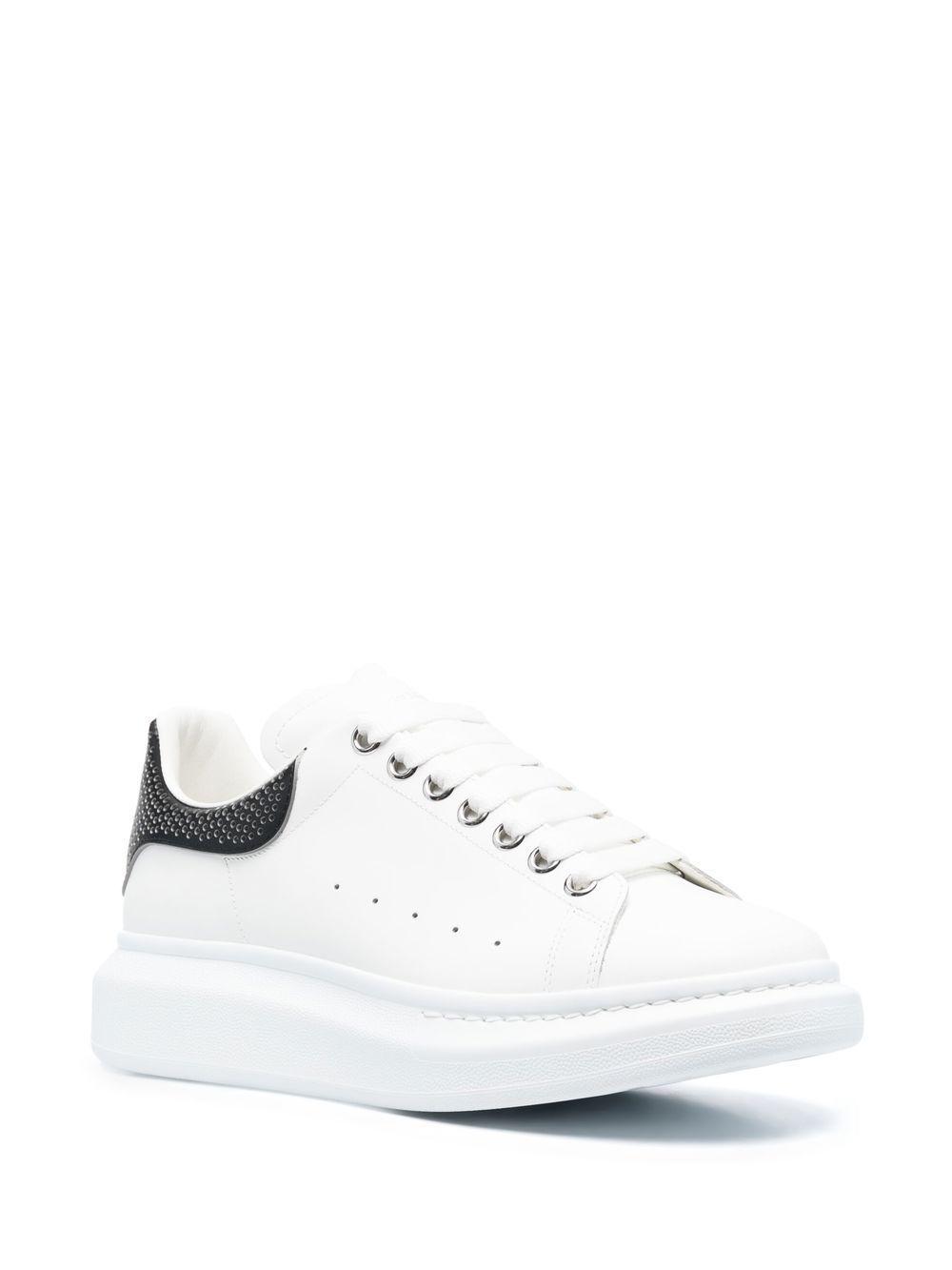 Oversized low-top leather sneakers Product Image