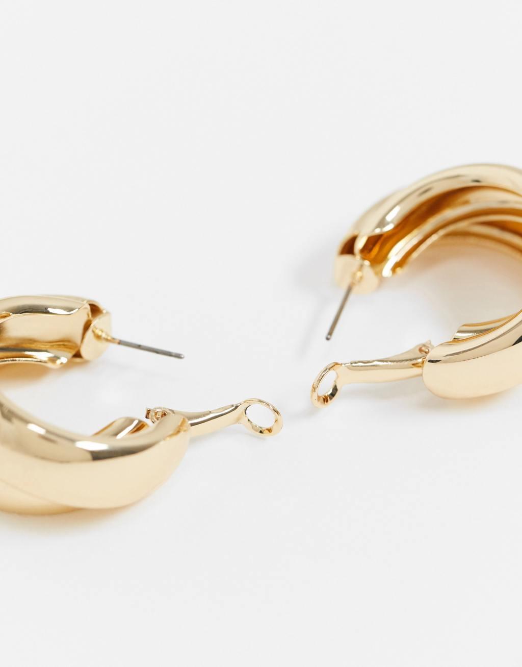 ASOS DESIGN hoop earrings with thick crossover design gold tone Product Image