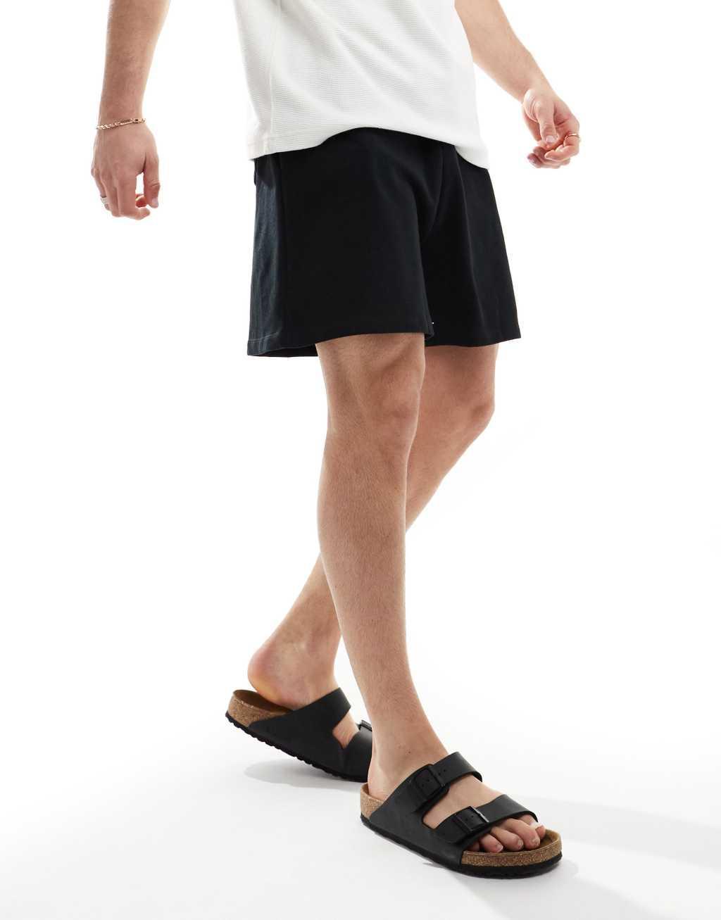 ASOS DESIGN oversized shorts in black Product Image