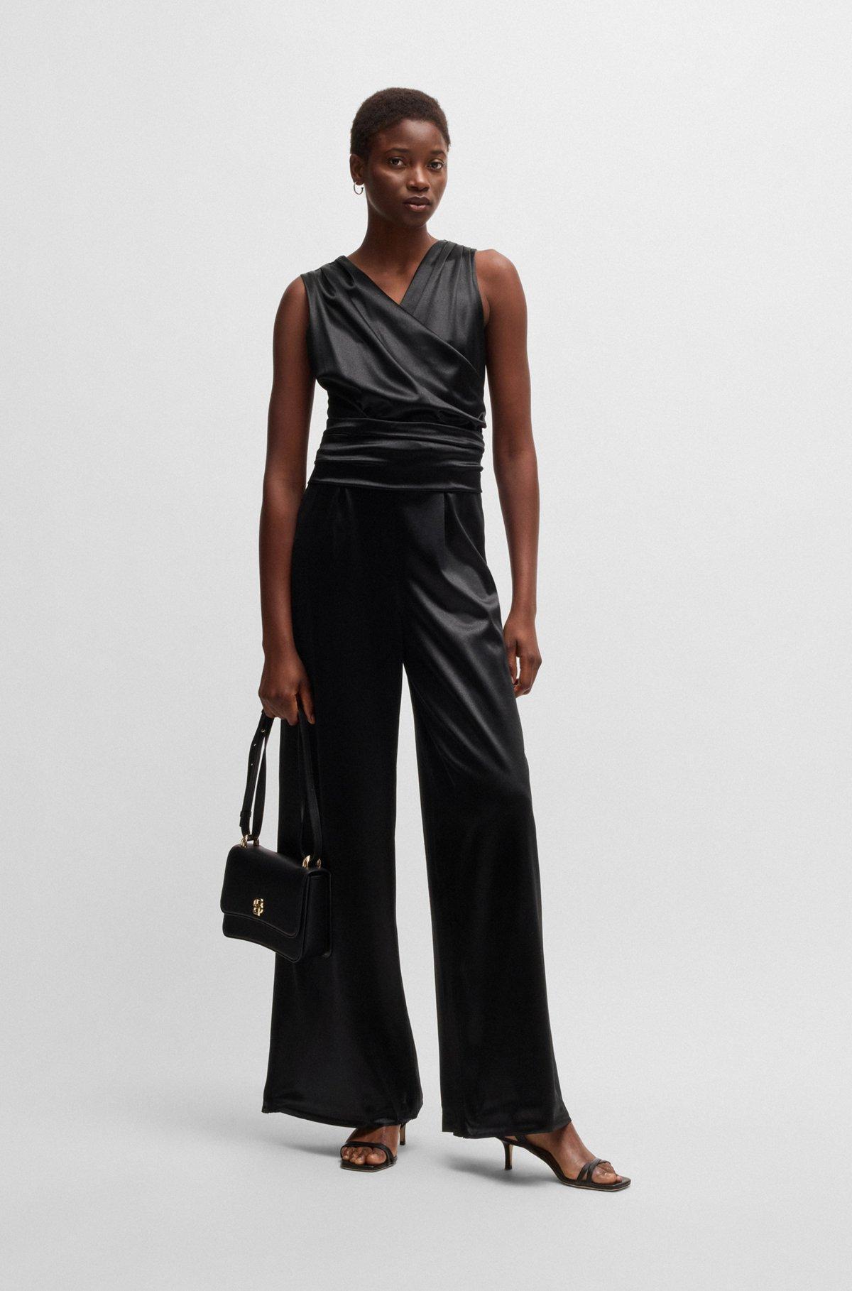 Sleeveless jumpsuit in lustrous jersey with wrap front Product Image