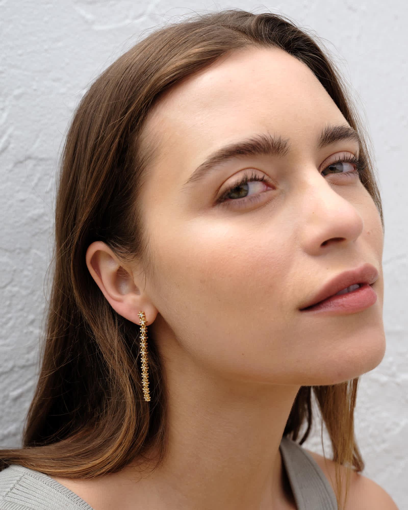 Nydia Gold Linear Earrings in White CZ Product Image