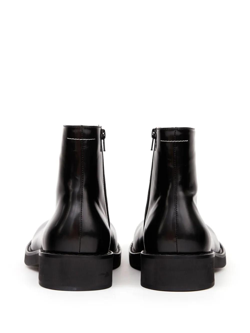 Trunk leather ankle boots Product Image