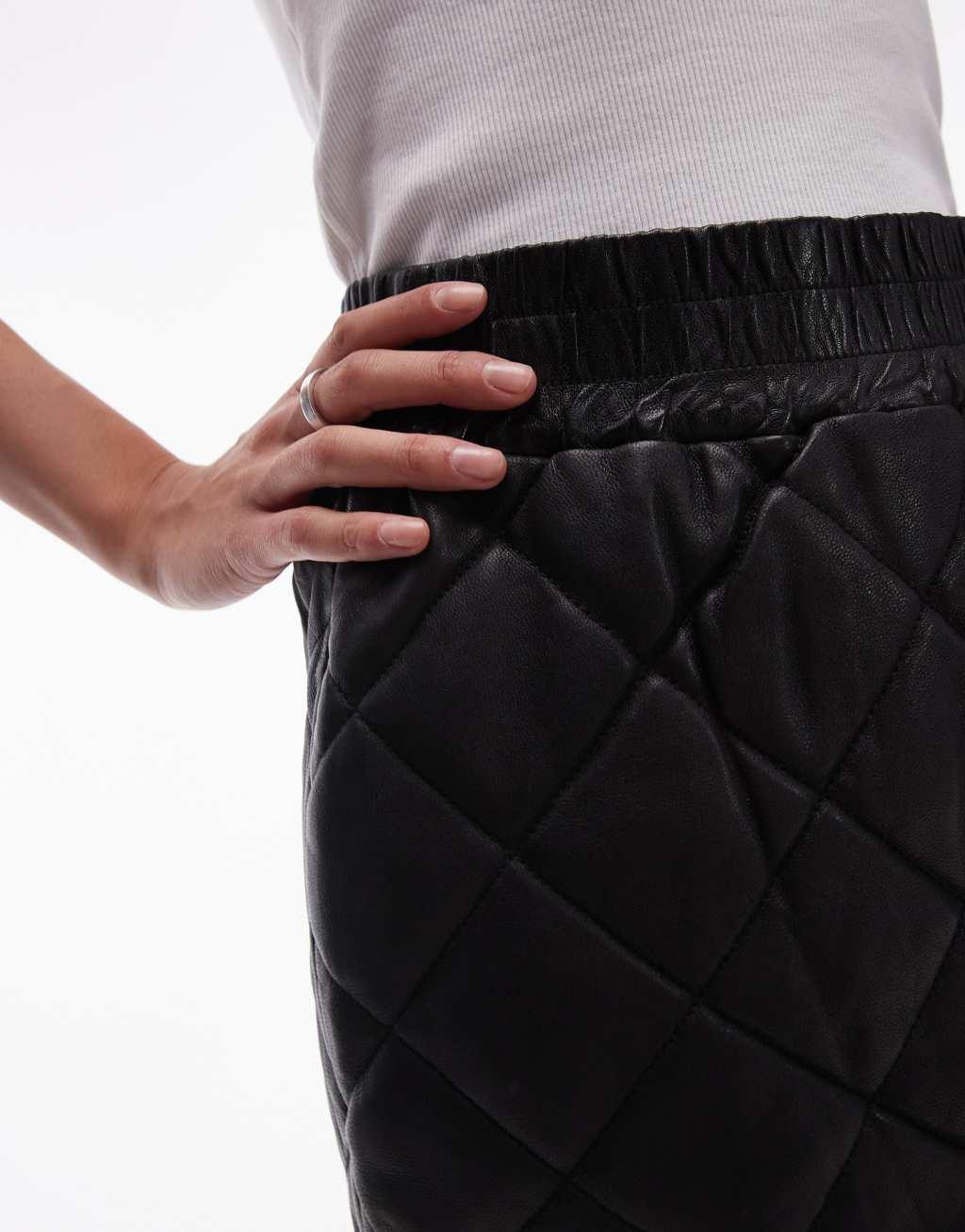 AllSaints Ottie leather quilt mini skirt in black Product Image
