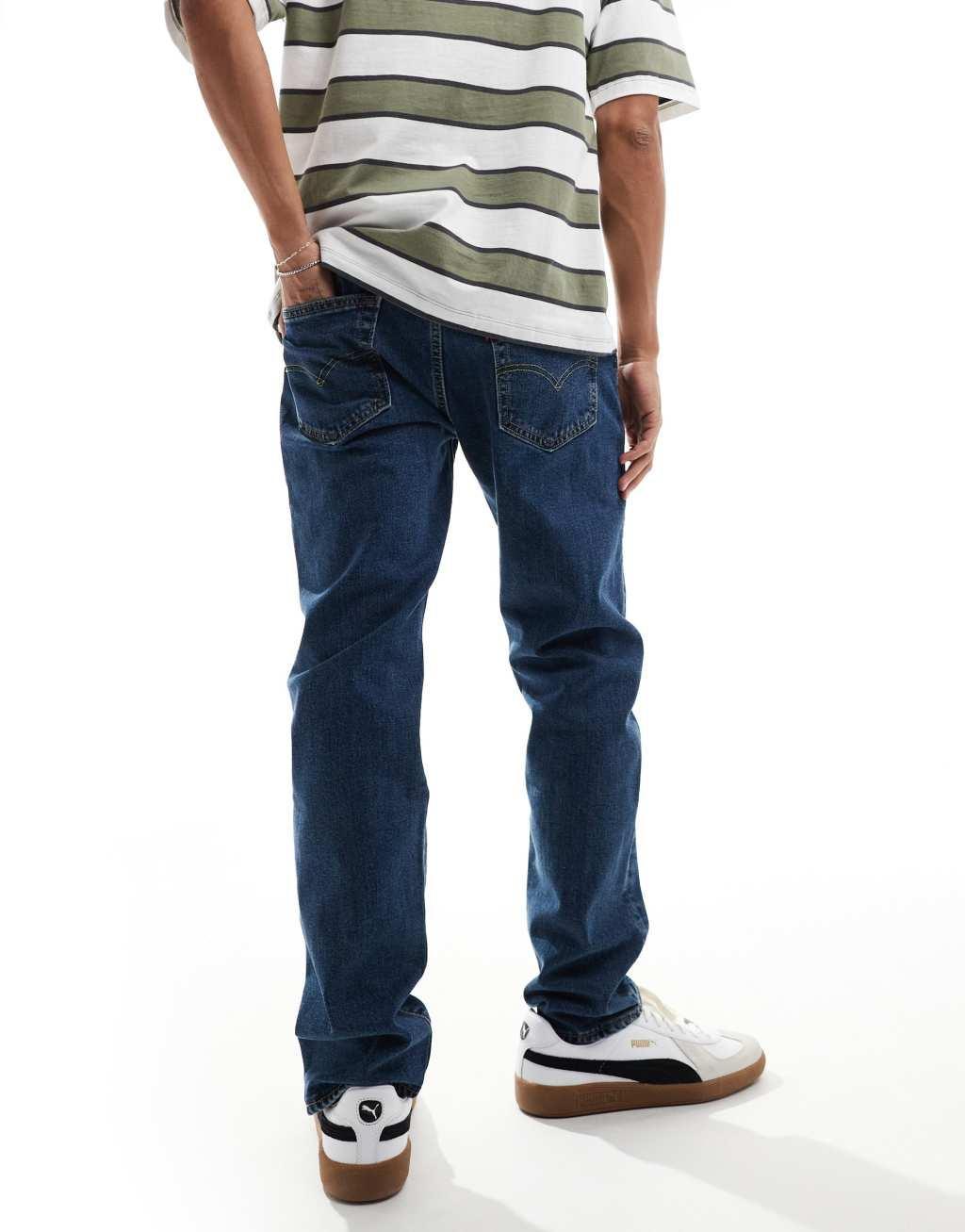 Levi's 502 taper fit jeans in mid blue Product Image