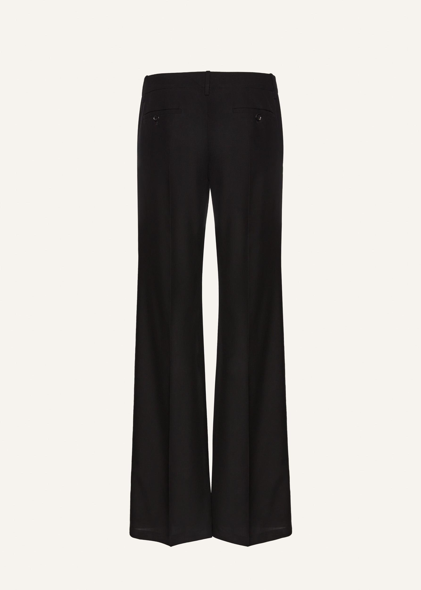 Front-pleat classic trousers in black Product Image