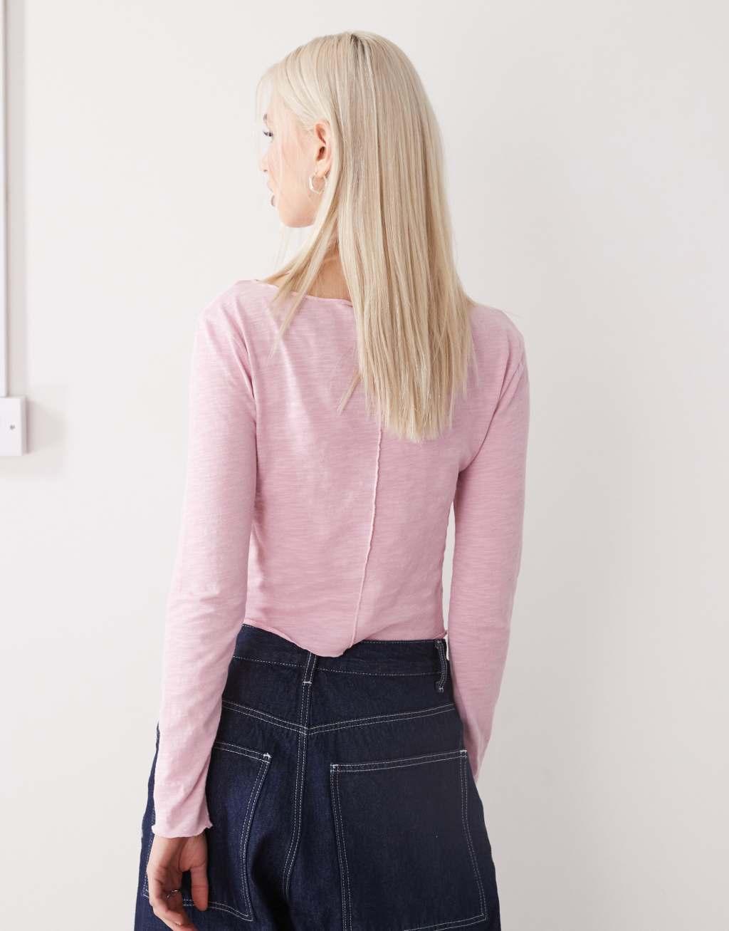 Reclaimed Vintage long sleeve seamed jersey top in pink Product Image