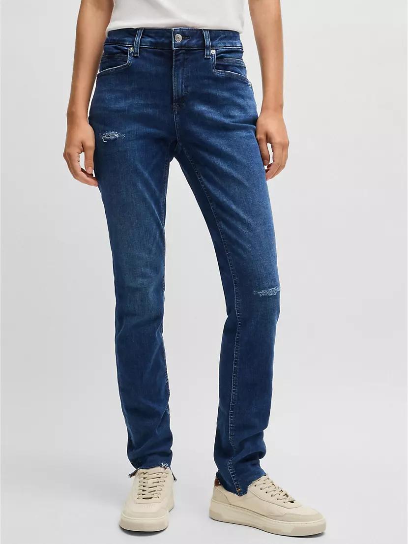 Jeans in Distressed Stretch Denim with Frayed Hems Product Image