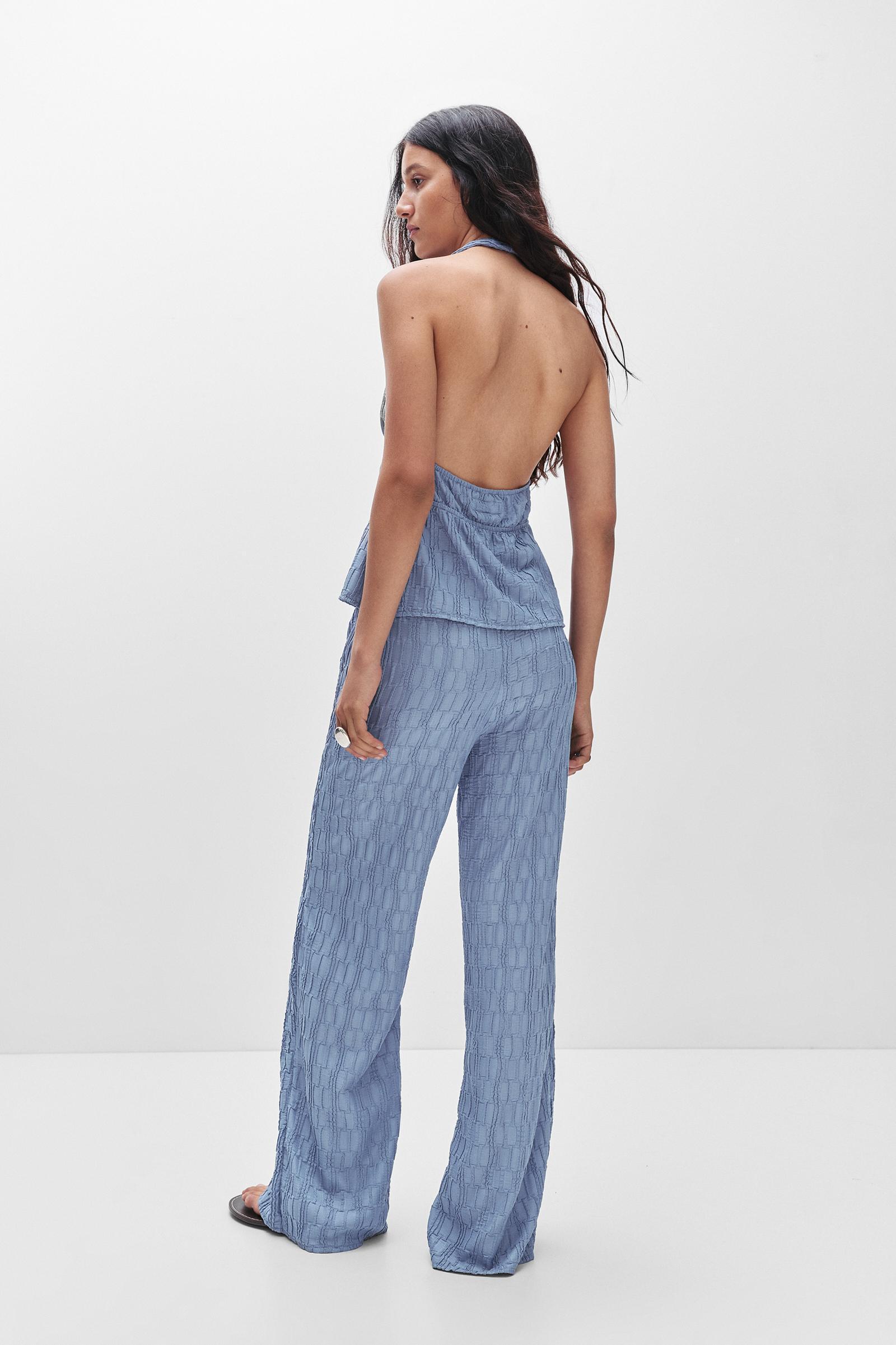 Textured bell bottom trousers Product Image
