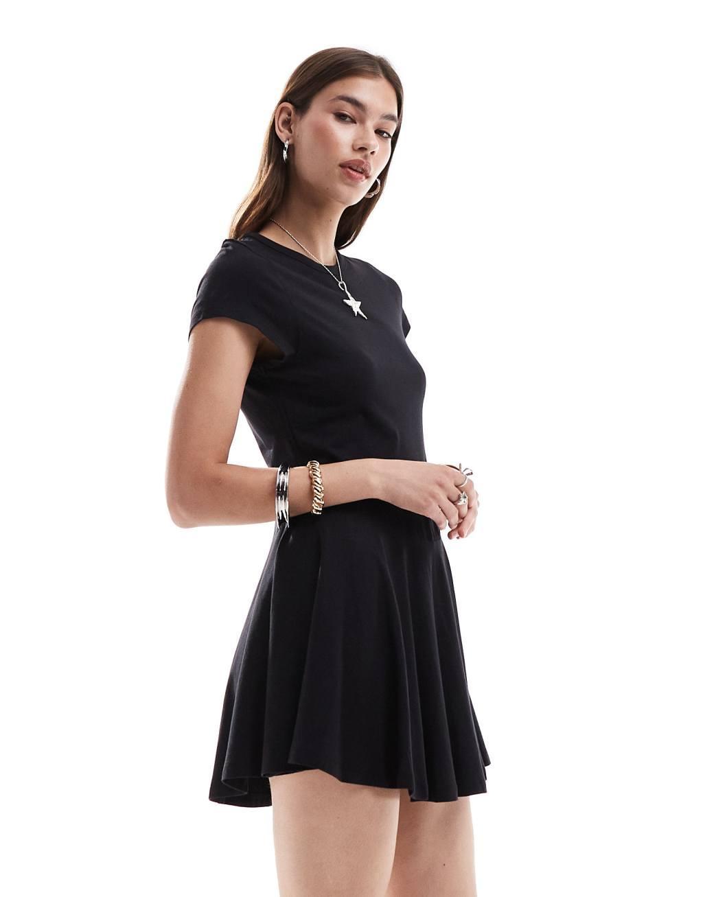 Monki short sleeve mini jersey dress with an a-line skirt in black Product Image