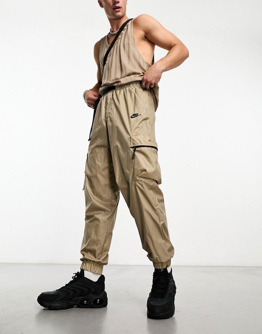 Nike Tech Essentials wind sweatpants in brown Product Image