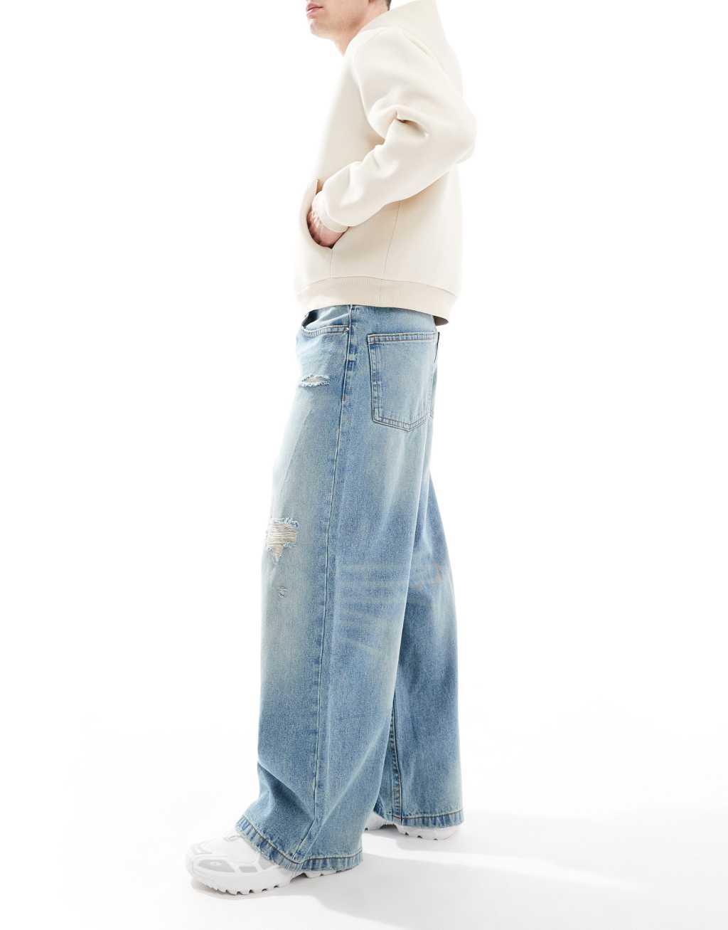 ASOS DESIGN super baggy jeans with rips in vintage light wash blue Product Image